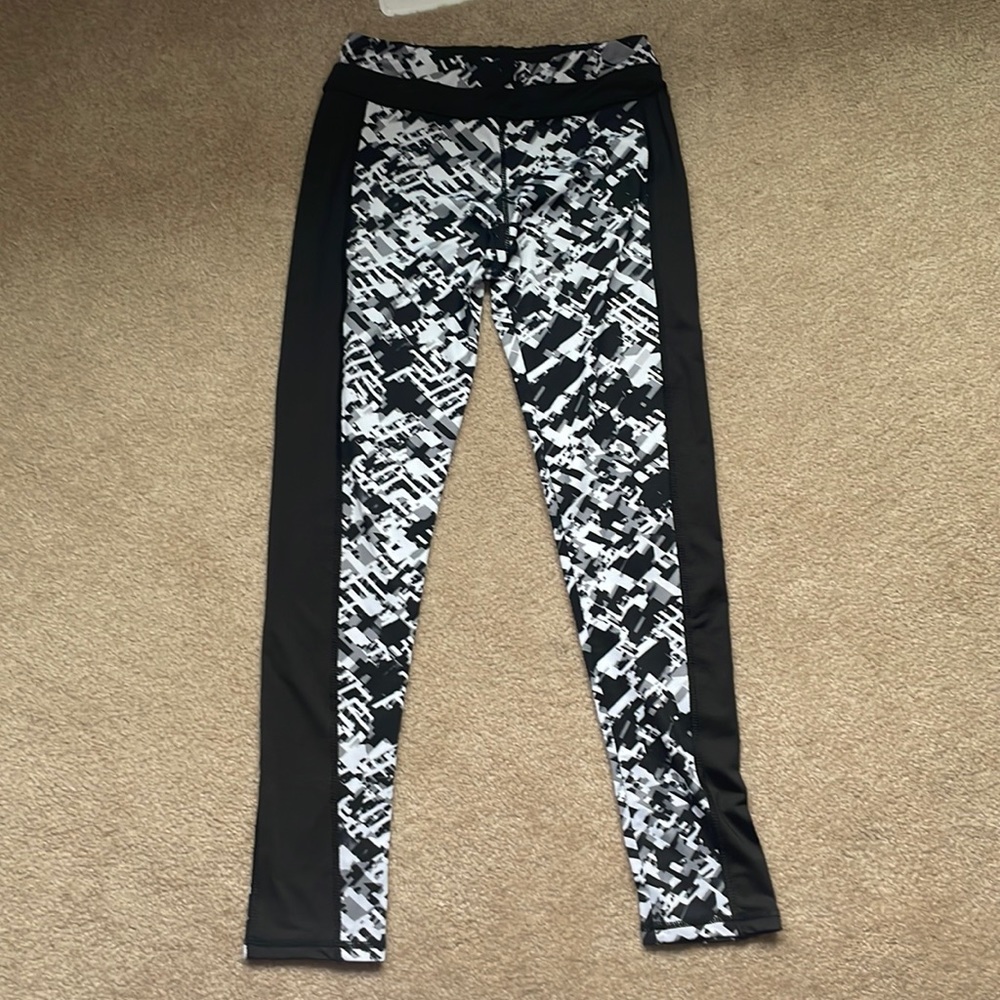 FIT IN leggings, With Pockets, Size small can fit a medium though, Barely worn.